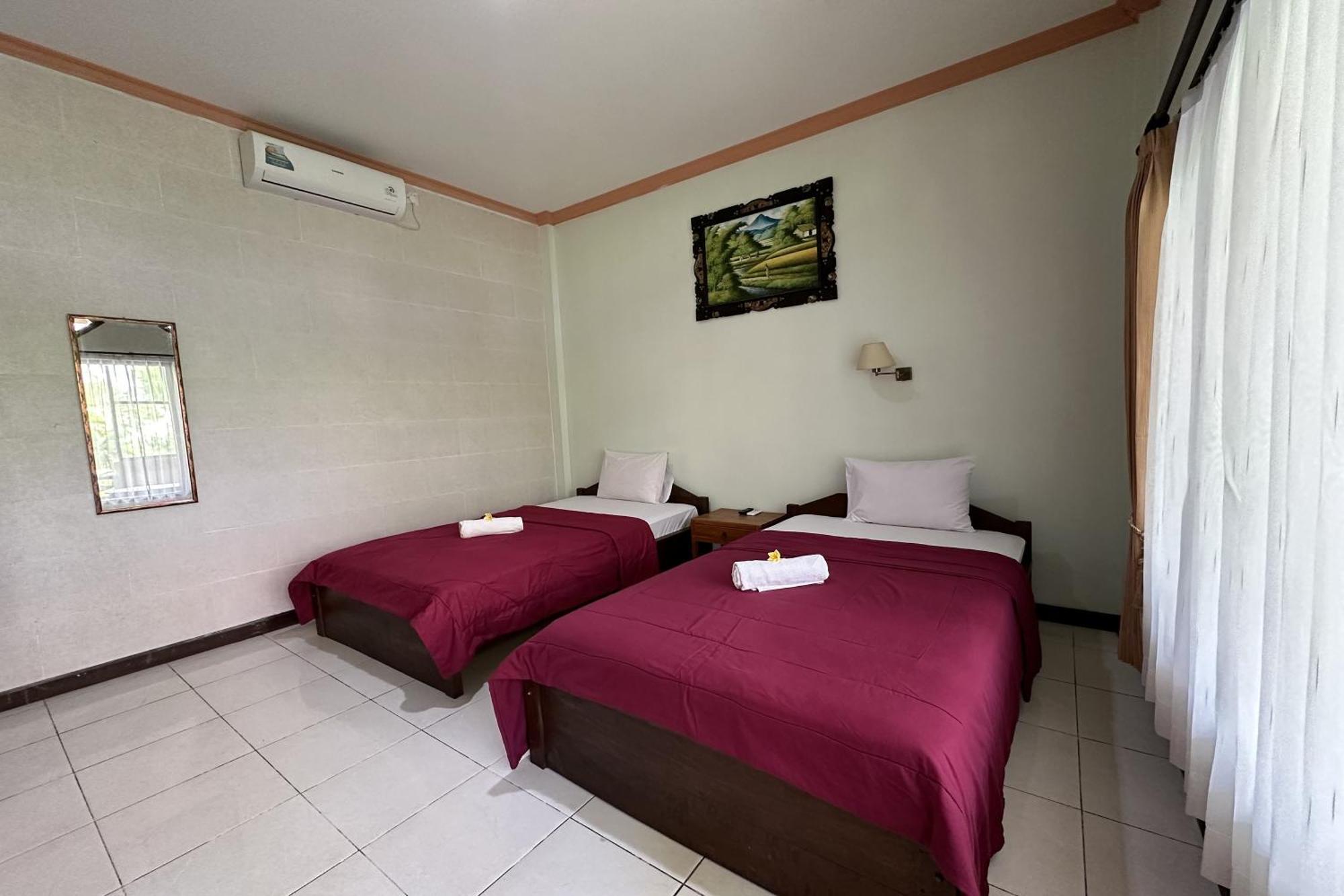 Taxa Raya Guest House Legian Buitenkant foto